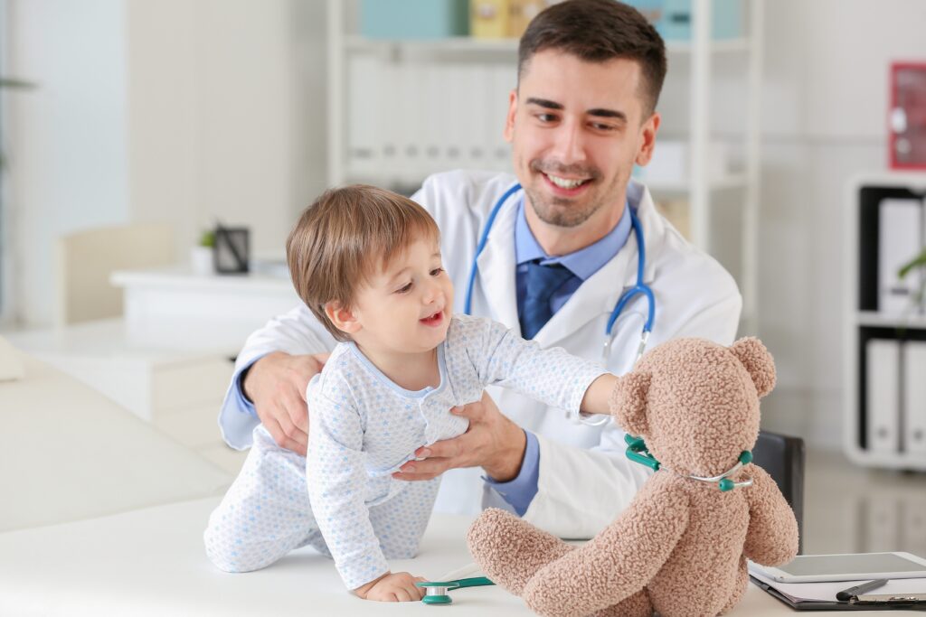 Direct primary care pediatrician with baby